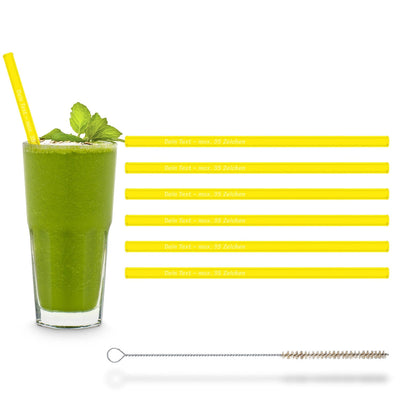Sechs neongelbe 20cm HALM Glasstrohhalme in einem Green Smoothie mit Reinigungsbürste, umweltfreundlich und wiederverwendbar.