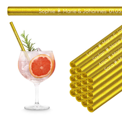 Wiederverwendbare HALM Glasstrohhalme in Gold für einen Grapefruit Gin Tonic auf einem Stapel aus 50 Trinkhalmen